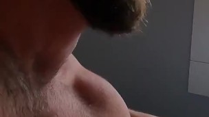 Two Bearded and Hairy Men Kissing