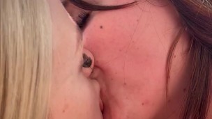 Two lesbian sluts tongue fucking each others mouths in bikinis