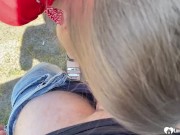 Cutie sucking dick outdoors