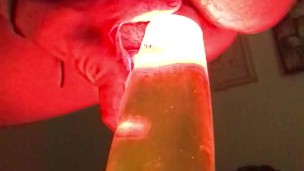 Girl slides her pussy over hot lava lamp