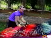 Guy with tattoos washes a tranny's car before hammering her big asshole outside 1/16