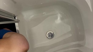 Taking a shower of piss and cum