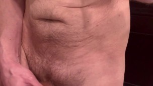 Nipple play with a little cock flexing