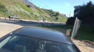 Muscular exhibitionist masturbating in front of traffic