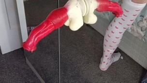 Riding a knotted fantasy dildo dressed in lingerie 3 alternative views