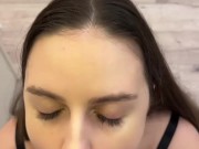 beautiful brunette with beautiful eyes gives a blowjob