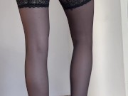 The secretary shows her stockings in shoes and a leather skirt 1/16