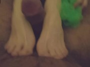 Skinny brunette gives a footjob in the bathroom 14/16