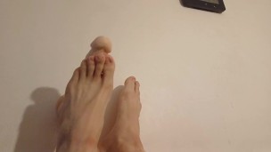 Massaging my dildo with my feet and showing off nails