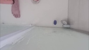 Massaging the dick in the bathtub