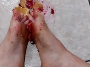 Closeup Smashing filled donuts with my feet 14/16