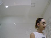 Hot Brunette College Girl with a Mini Tennis Skirt and Over Knee Socks in the Bathroom shows Panties Under Her Short Skirt 9/16