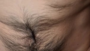 Guy with hairy lumberjack body jerking off his bushy dick and smelling musky socks and briefs