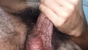 Late night jerking off. Hairy dude jacks his veiny smelly cock till cumming on chest, armpits, bushy