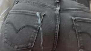 I suck his cock and he cums on my jeans ass