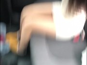 Caleña combs her hair and changes her clothes in the back seat of the Uber 16/16