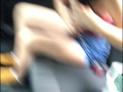 Caleña combs her hair and changes her clothes in the back seat of the Uber