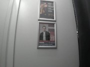 In the fitting room I try on T-shirts. 10/16