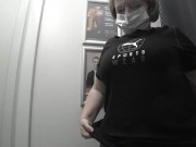 In the fitting room I try on T-shirts. 8/16