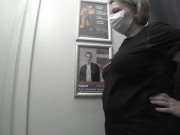 In the fitting room I try on T-shirts. 9/16