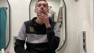 smoking and jerking on a public bathroom
