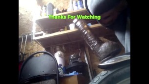 PV Riding Large Black Toy To Balls On Bike Fender In Shed