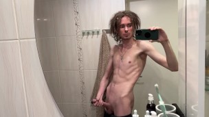 Cute hippie twink strips in bathroom and jerks off