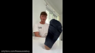 Dominant Aussie boy teases you with his stinky black socks and soles making you sniff