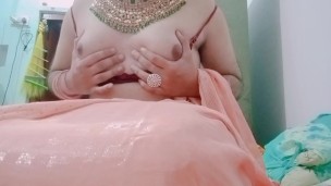 Indian Gay Crossdresser Gaurisissy pressing her big boobs and fingering in her clean shaved big ass