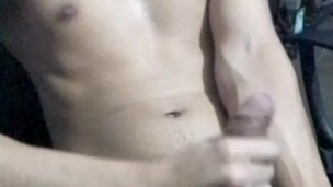 Guy in shorts masturbates until he has an orgasm