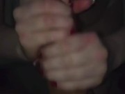 Sexy MILF answers door in bra and panties and gives delivery boy handjob for a tip