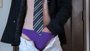 An exhibitionist Japanese man wearing a mask is masturbating.