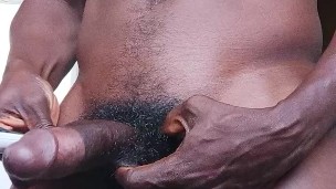 Pissing and Show off time super hung shows off his big dick measuring it with a paste tube