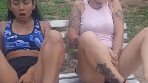 two athletes touching each other and licking pussy in the park