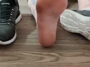 Removing dirty white ankle socks from my dirty and sweaty feet