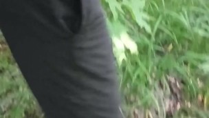 A young guy jerks off in the woods. the guy wants to have sex. sweatpants. sneakers. Pissing.