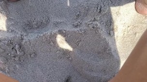 squirting at the nude beach while people walk by