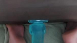 Close up dildo riding feet