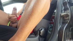 Sexy exhibitionist jerks off in car in a risky way with people passing by