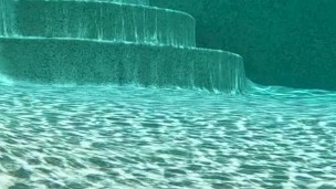 Sunlit Furry Redhead Underwater 4K
