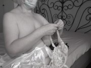 A mature BBW milf tries on bras with big natural saggy tits. 3/16