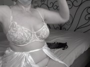 A mature BBW milf tries on bras with big natural saggy tits. 5/16