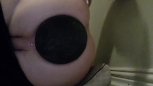 Giant xl butt plug under my tights held by Tiny g string