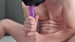Locked in chastity stuffing.my ass with double ended dildo.