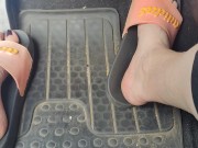 Revving the pedals of my mini Cooper with my pink Adidas slides 3/16