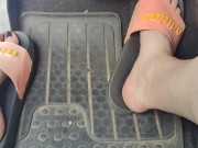 Revving the pedals of my mini Cooper with my pink Adidas slides 5/16