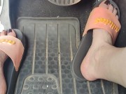 Revving the pedals of my mini Cooper with my pink Adidas slides 9/16