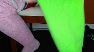 Putting on 12 pairs of thigh high socks