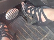 Big feet pedal pumping the gas pedal in strappy sexy black heels