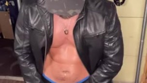 Bearded jock in leather eats precum